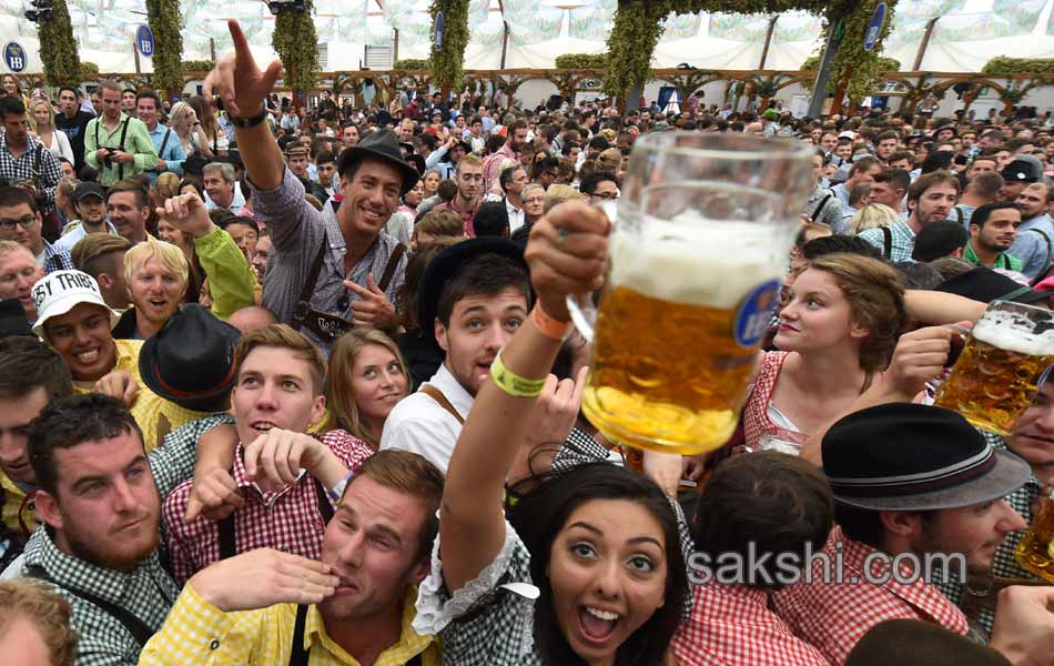 Visitors enjoys the Oktoberfest beer festival in Munich Germany7