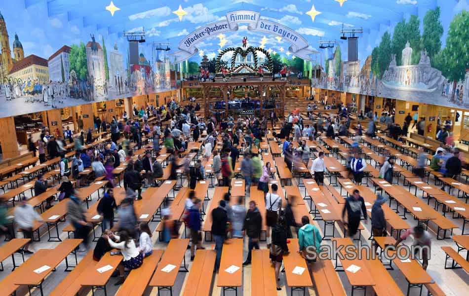 Visitors enjoys the Oktoberfest beer festival in Munich Germany10