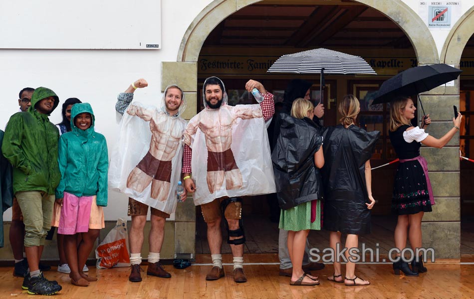 Visitors enjoys the Oktoberfest beer festival in Munich Germany12