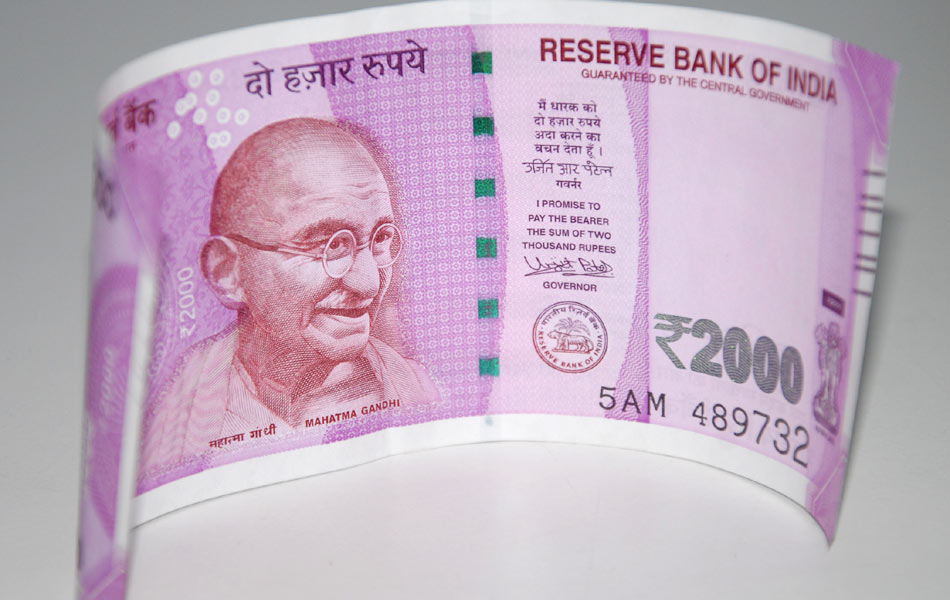 New currency smiles - Sakshi5