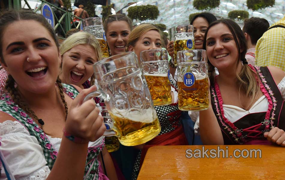 Visitors enjoys the Oktoberfest beer festival in Munich Germany1