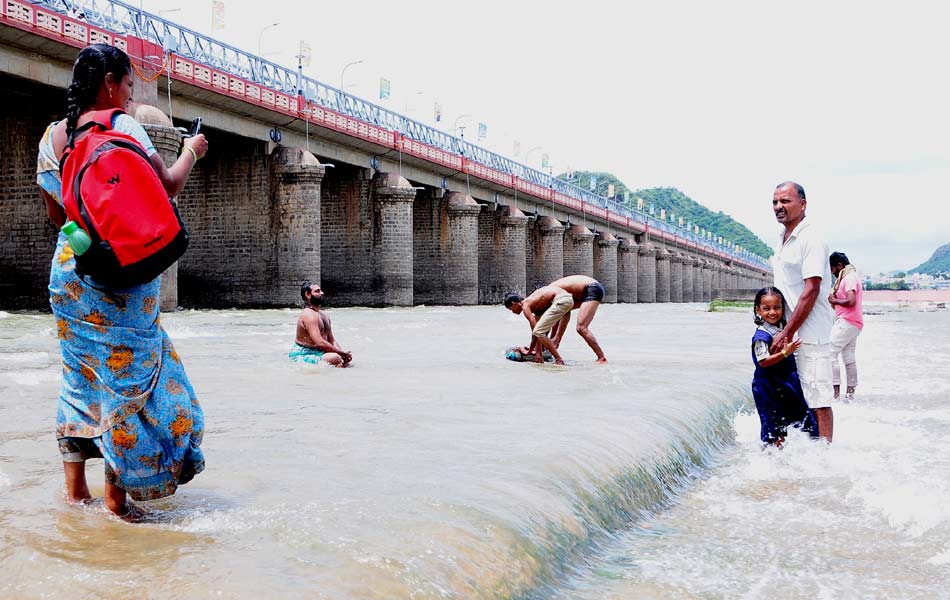 high water levels at prakasam  barrage - Sakshi15