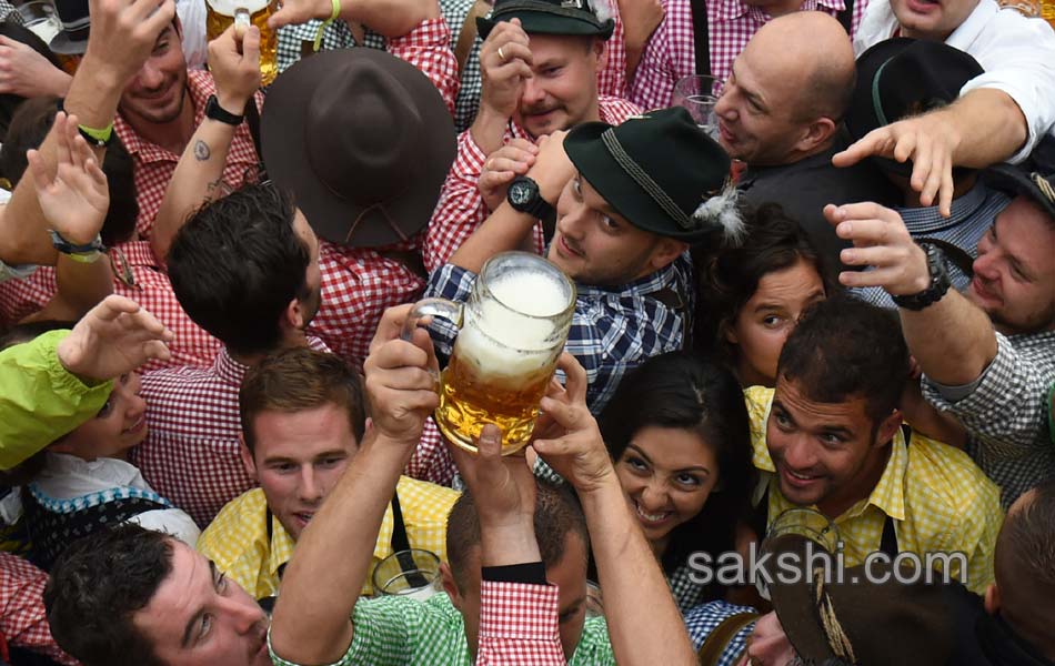 Visitors enjoys the Oktoberfest beer festival in Munich Germany4