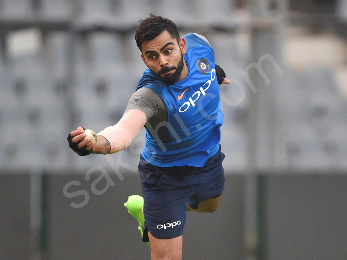 Indias cricket players practice in Mumbai - Sakshi4
