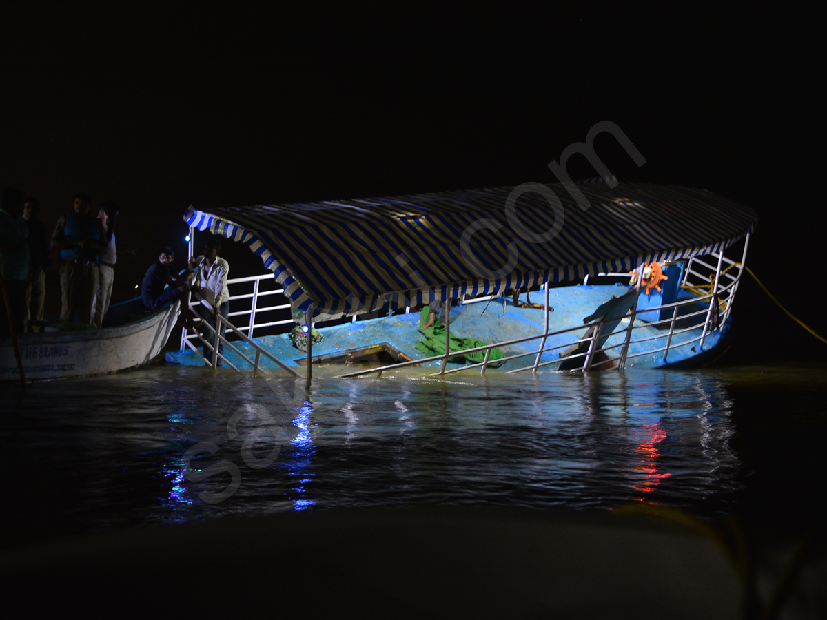 vijayawada boat turns over krishna river - Sakshi2