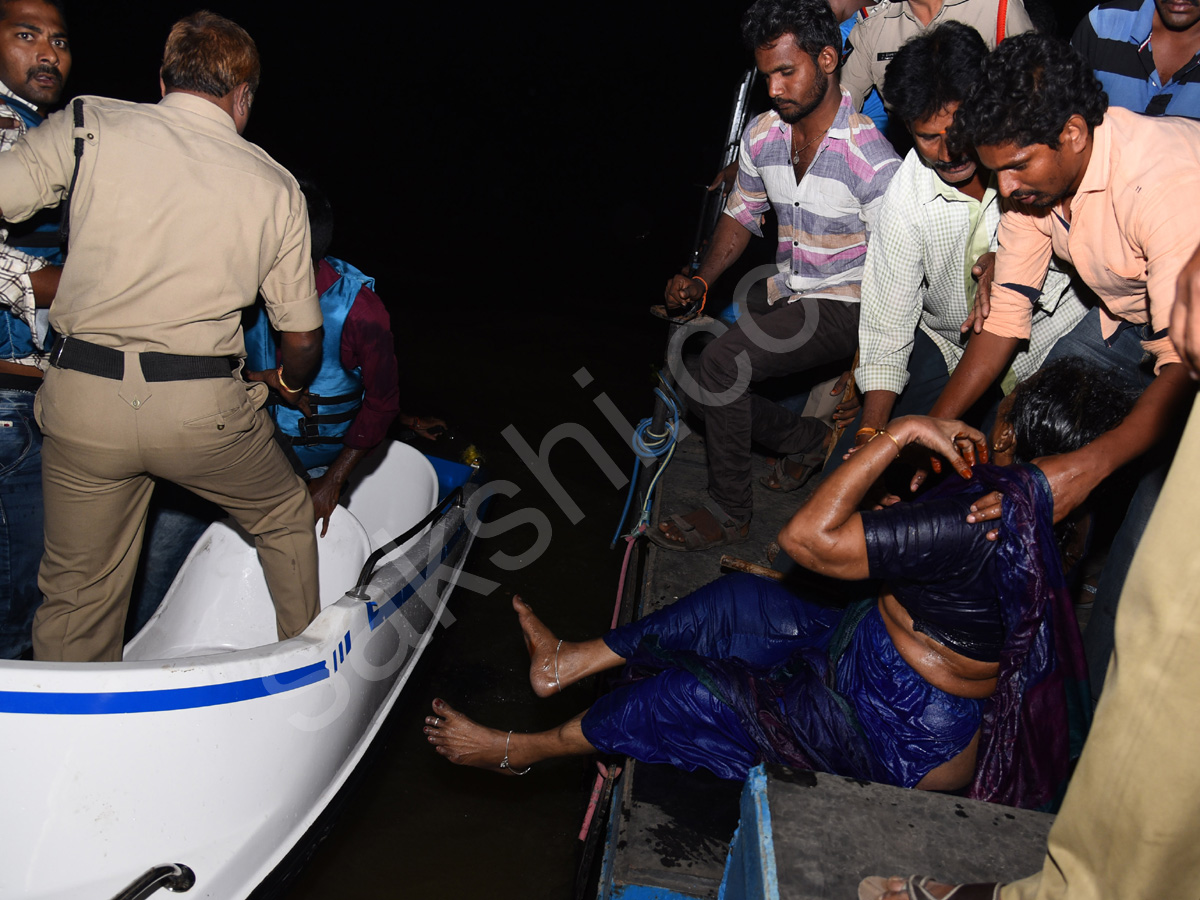 vijayawada boat turns over krishna river - Sakshi11
