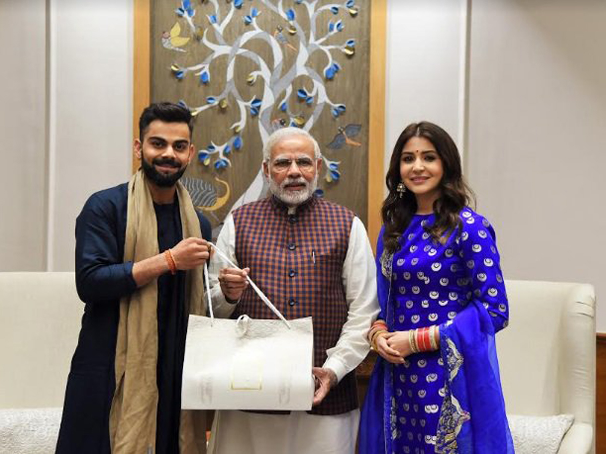virat kohli and AnushkaSharma met PM narendramodi - Sakshi1