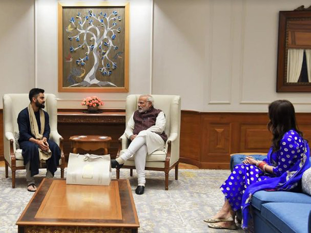 virat kohli and AnushkaSharma met PM narendramodi - Sakshi2