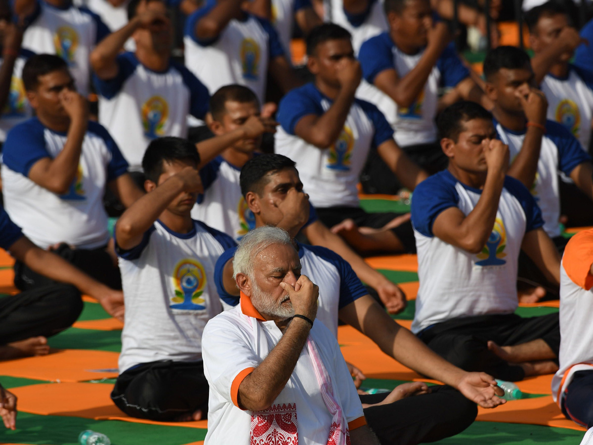 International Yoga Day Dehradun in Narendra Modi Photo Gallery - Sakshi10