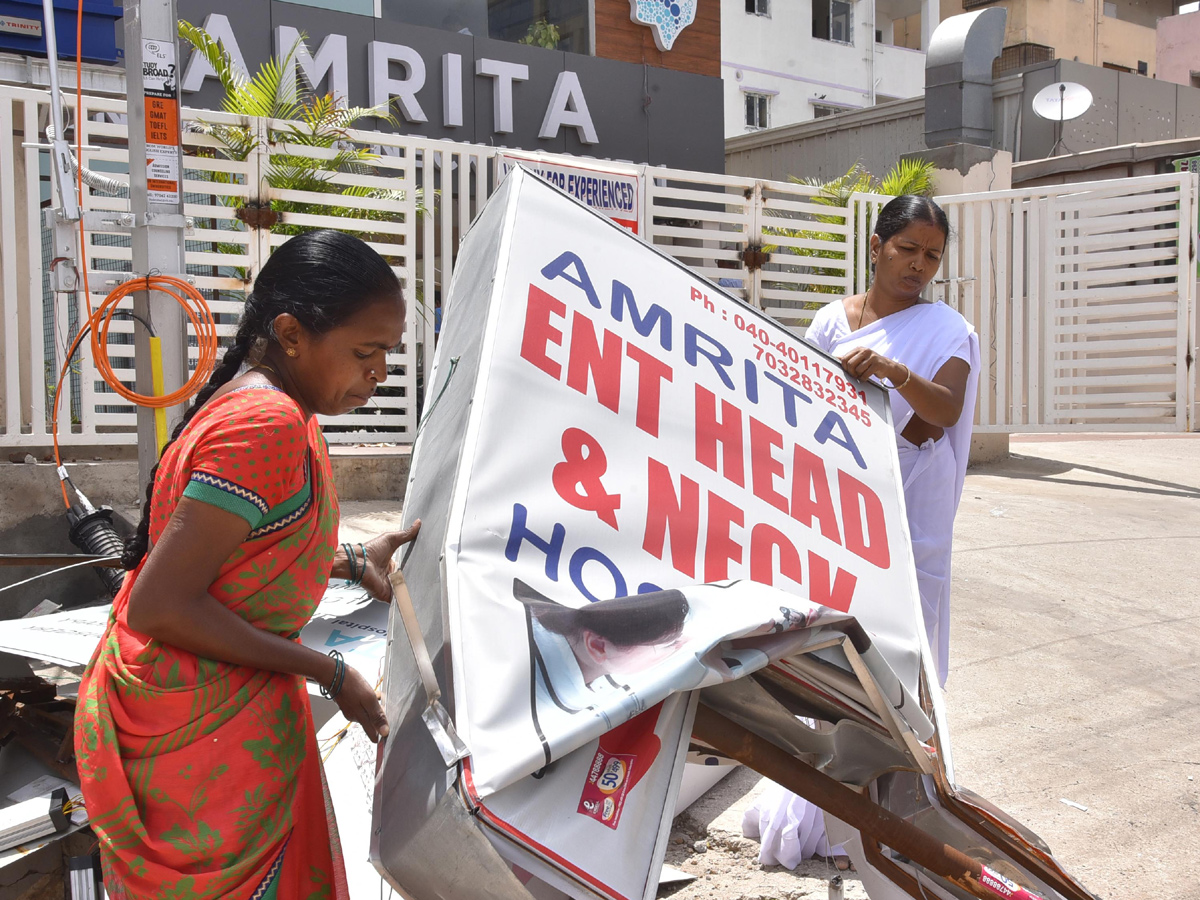 Demolition of Footpath Photo Gallery - Sakshi11