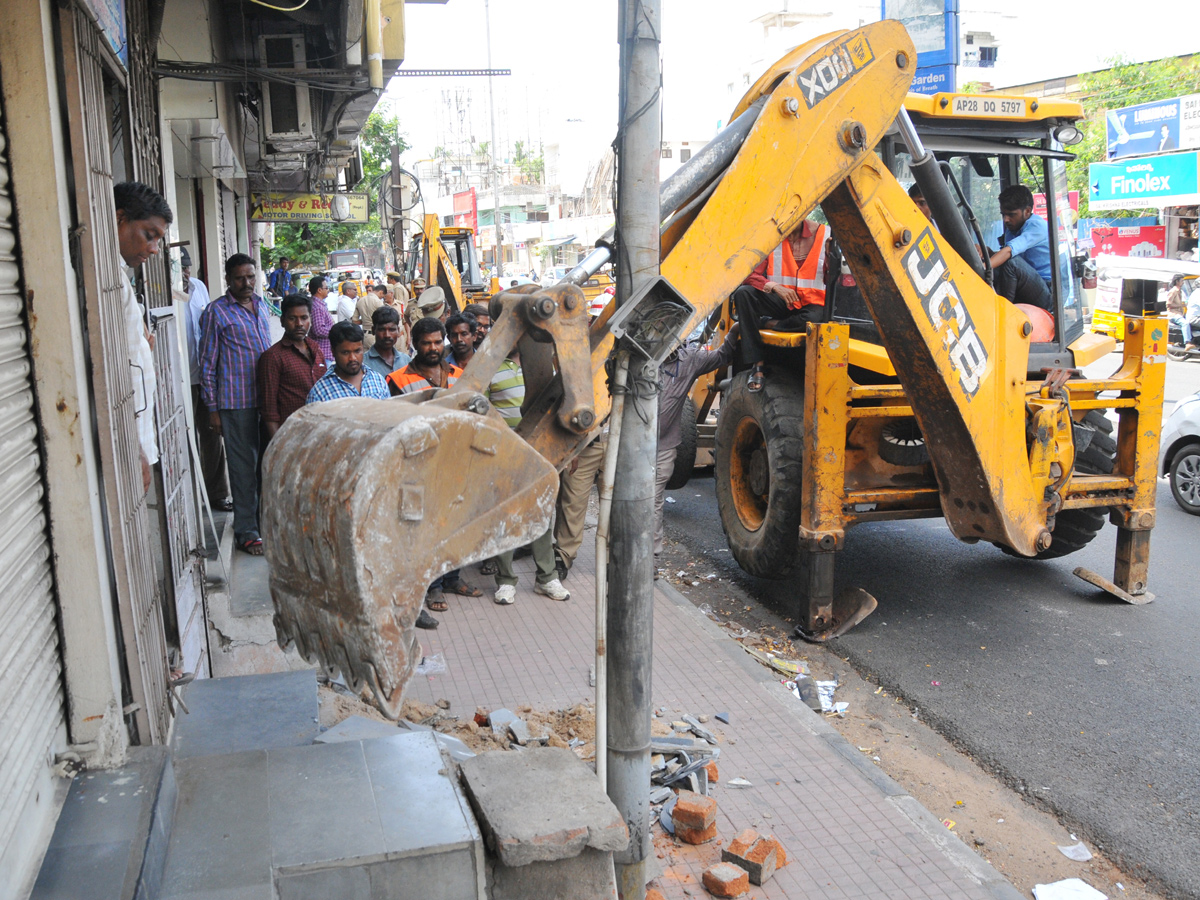 Demolition of Footpath Photo Gallery - Sakshi3