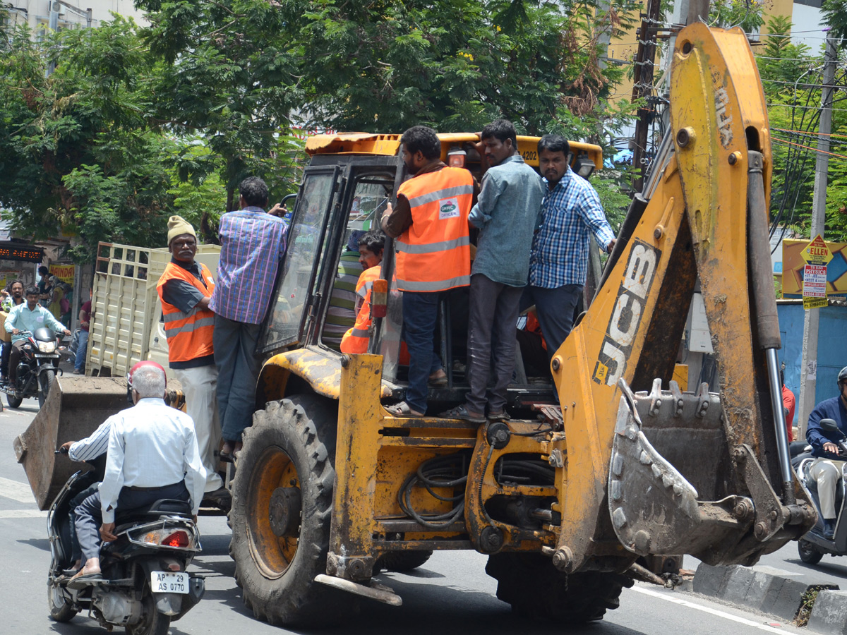 Demolition of Footpath Photo Gallery - Sakshi22