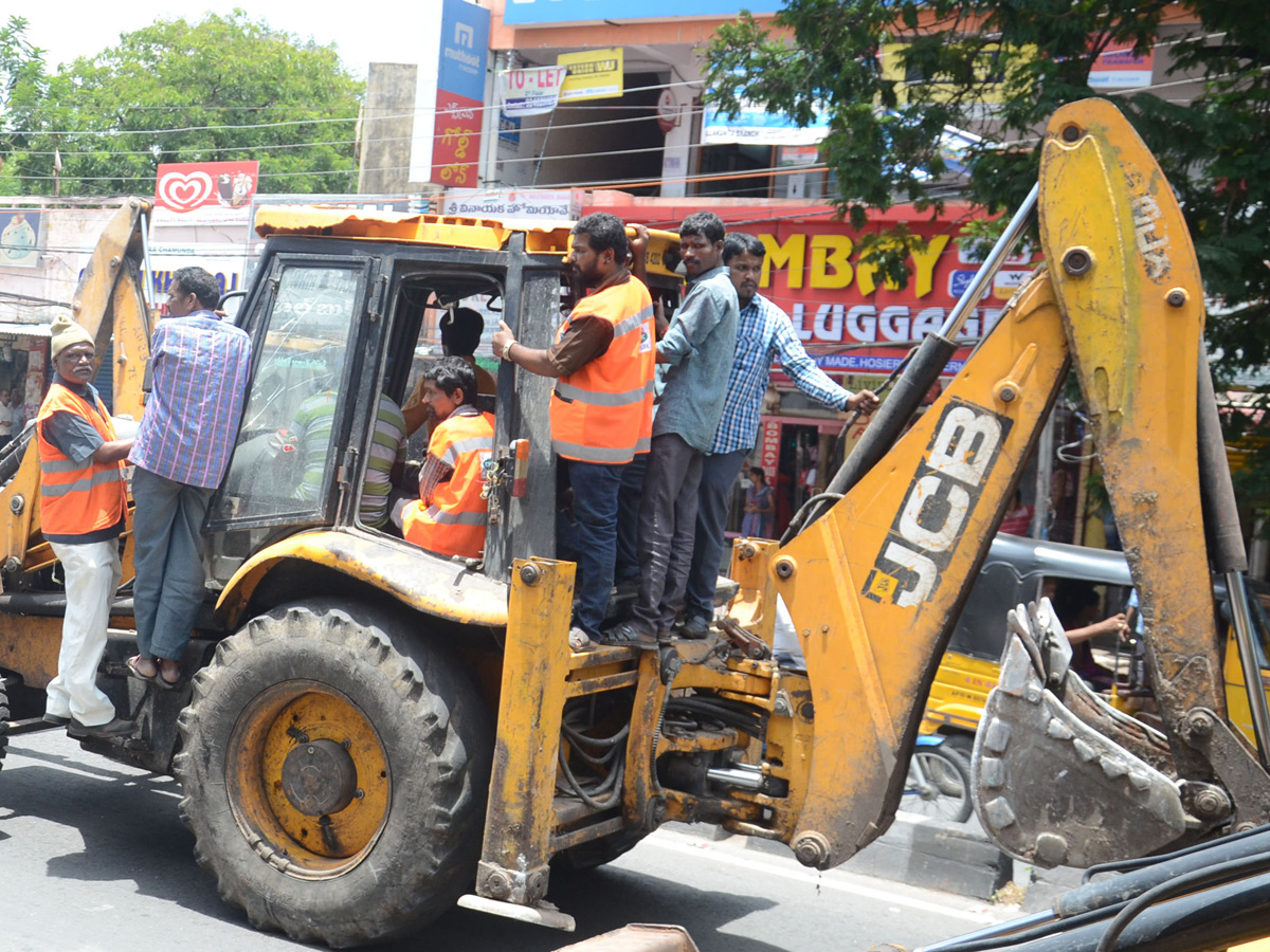 Demolition of Footpath Photo Gallery - Sakshi23