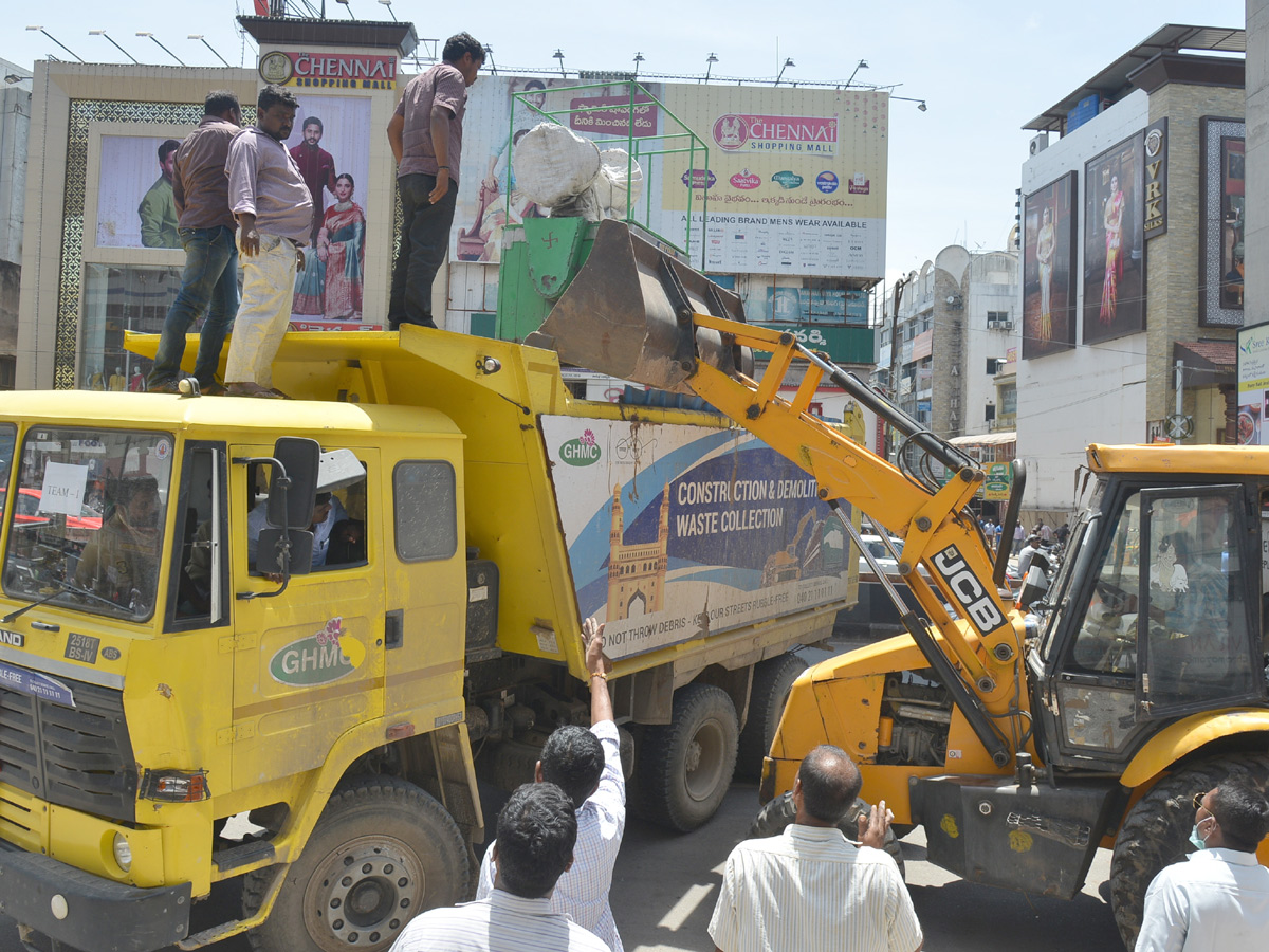 Demolition of Footpath Photo Gallery - Sakshi29