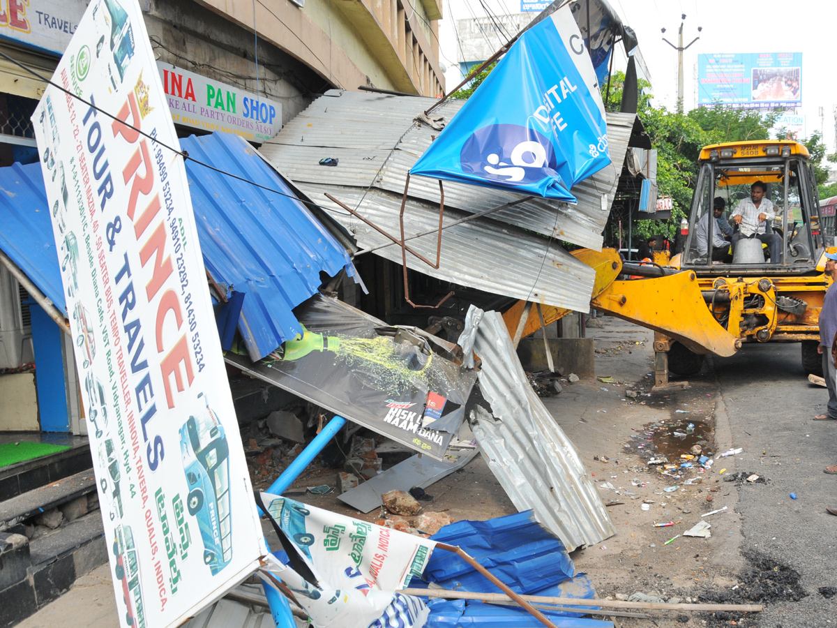 Demolition of Footpath Photo Gallery - Sakshi4