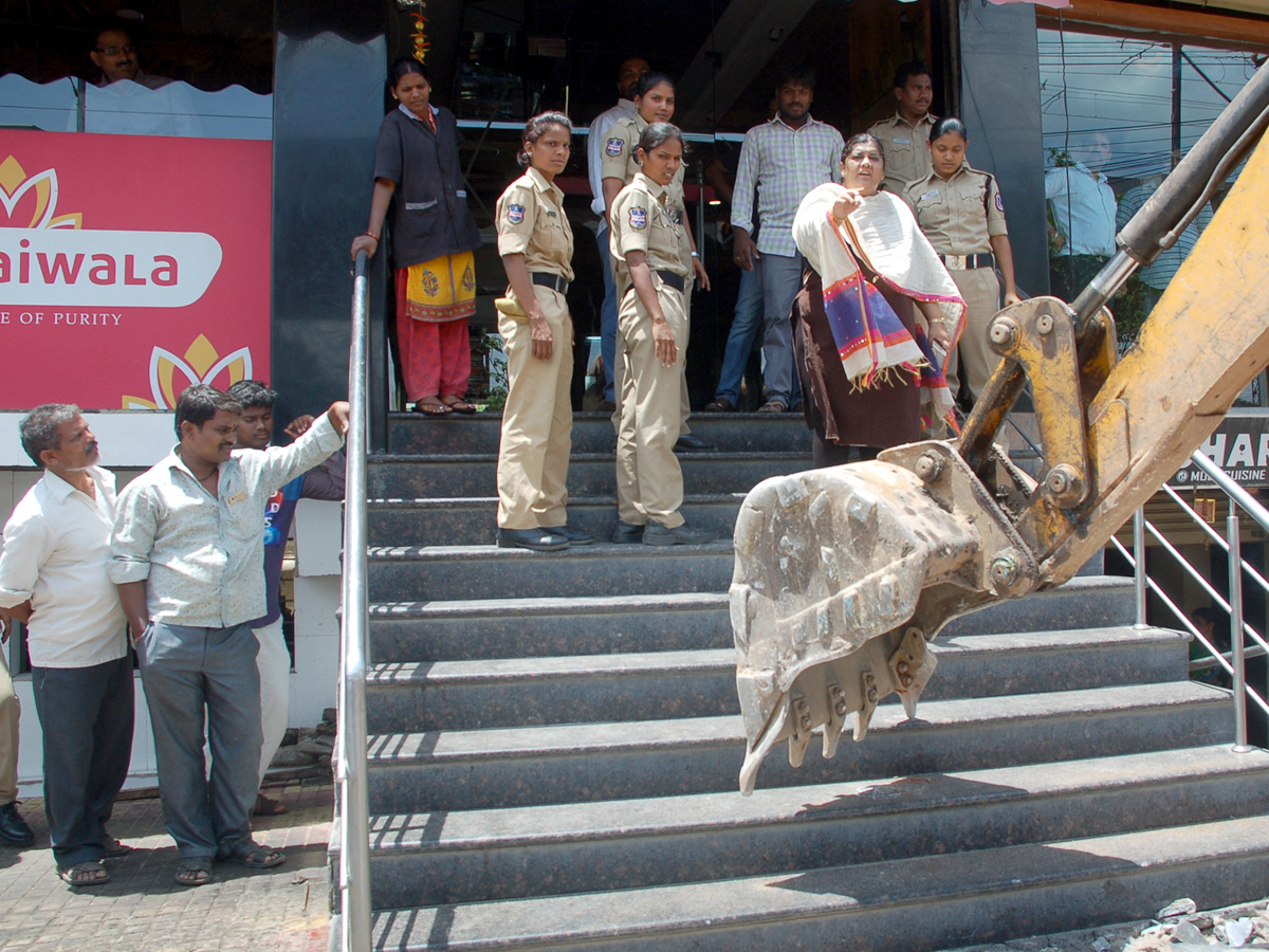 Demolition of Footpath Photo Gallery - Sakshi33