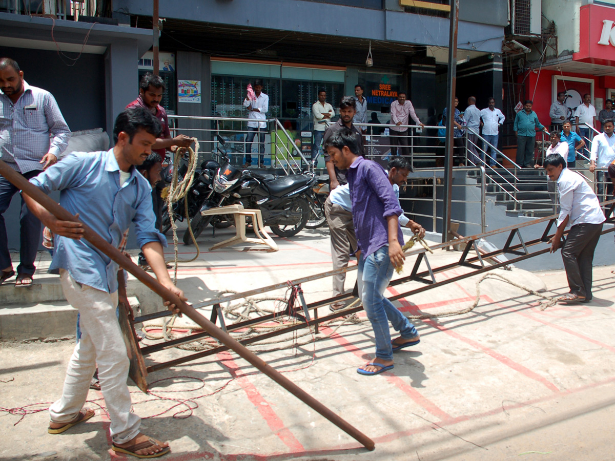Demolition of Footpath Photo Gallery - Sakshi34
