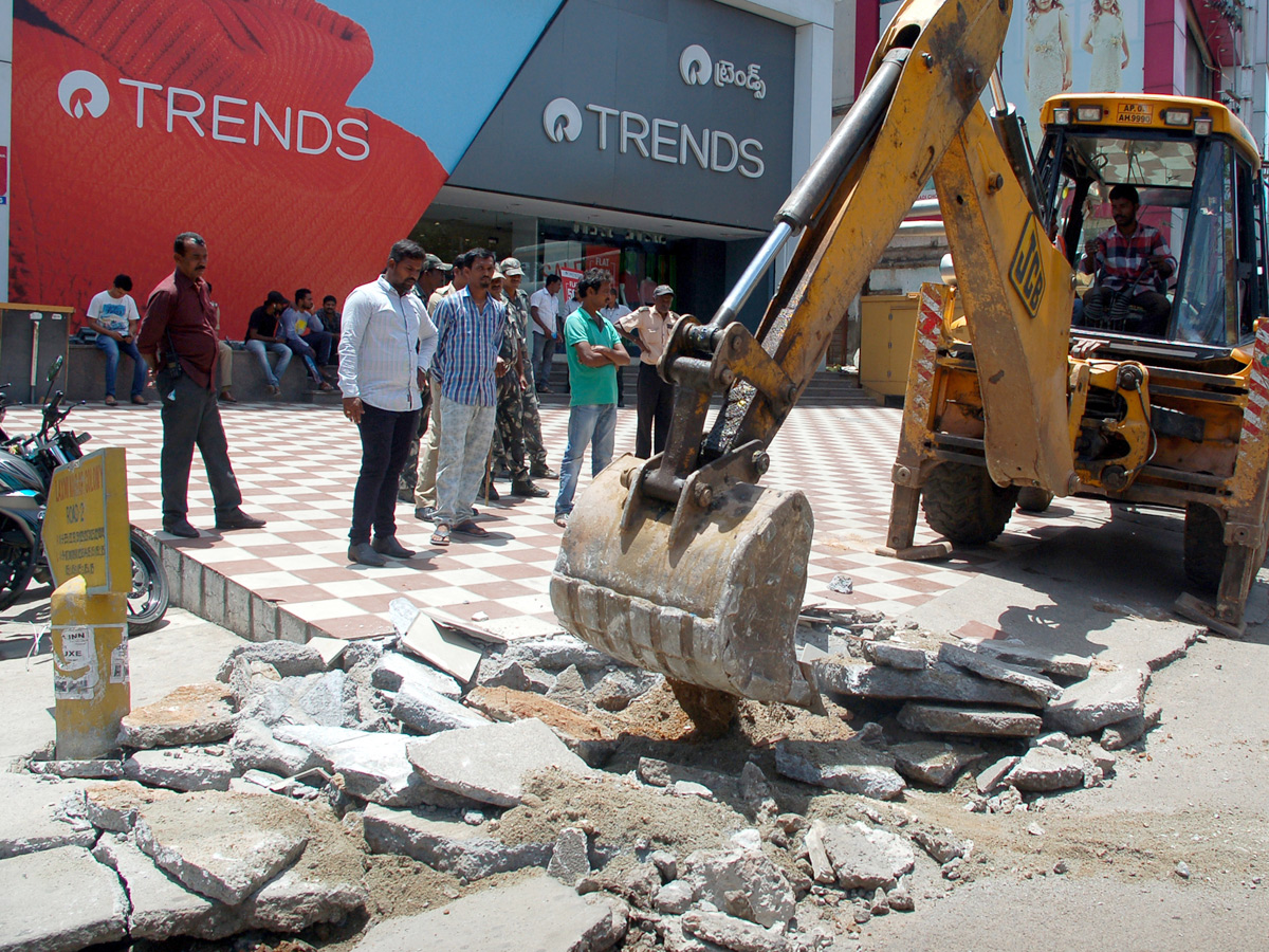 Demolition of Footpath Photo Gallery - Sakshi36