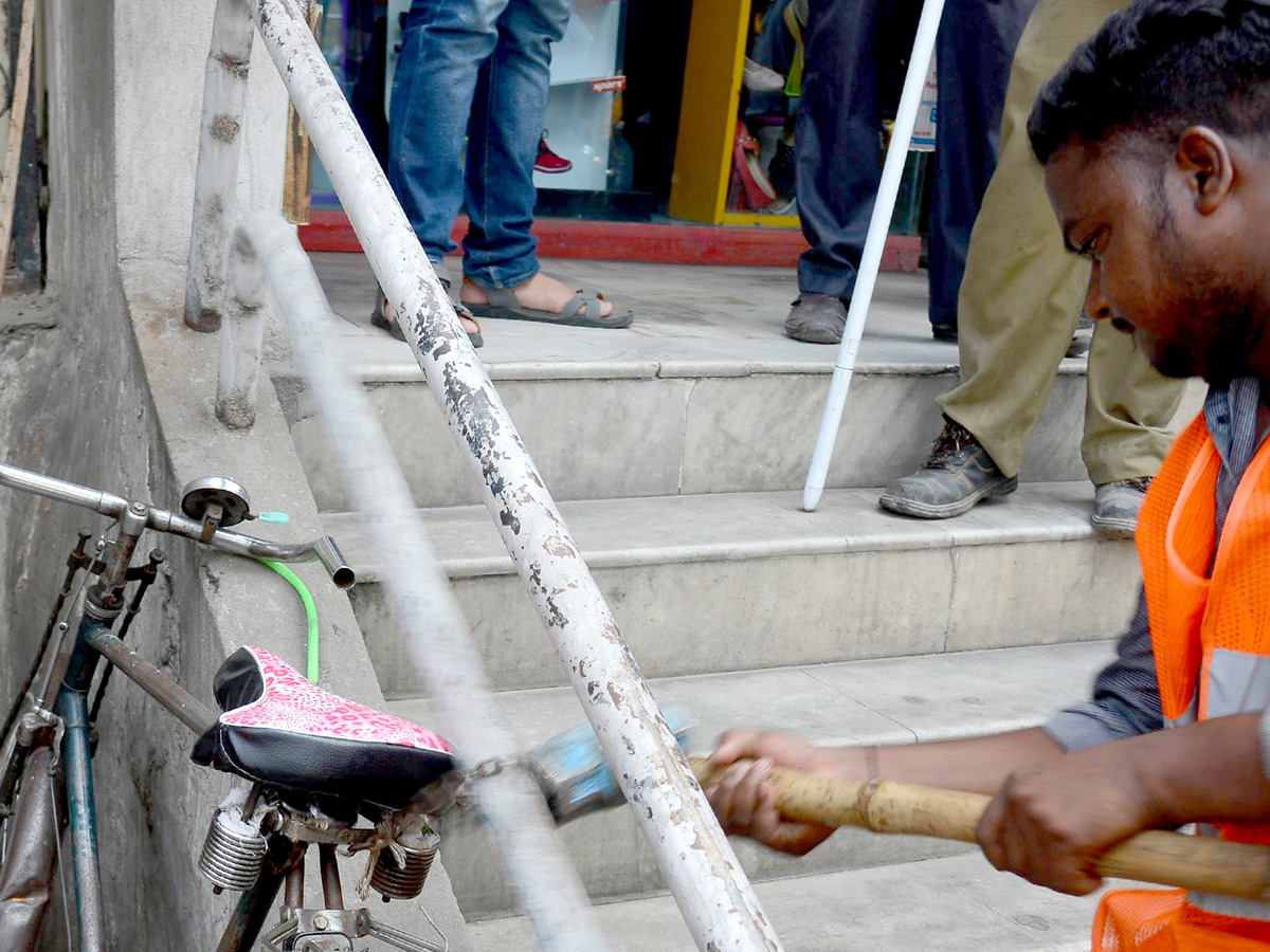 Demolition of Footpath Photo Gallery - Sakshi39