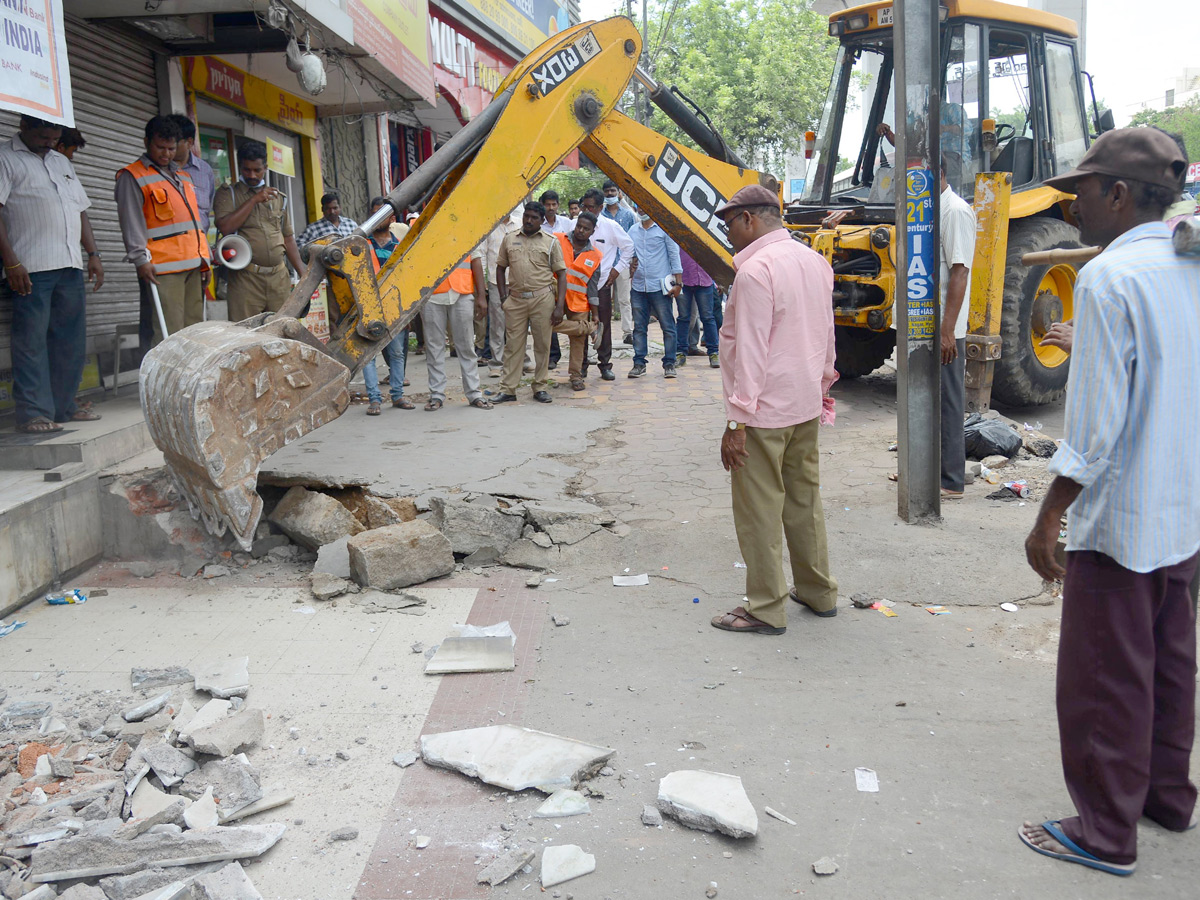 Demolition of Footpath Photo Gallery - Sakshi40