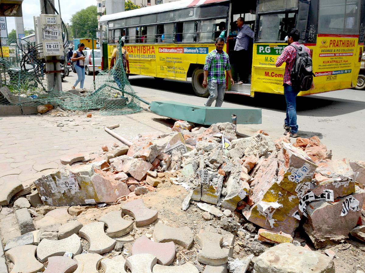 Demolition of Footpath Photo Gallery - Sakshi43