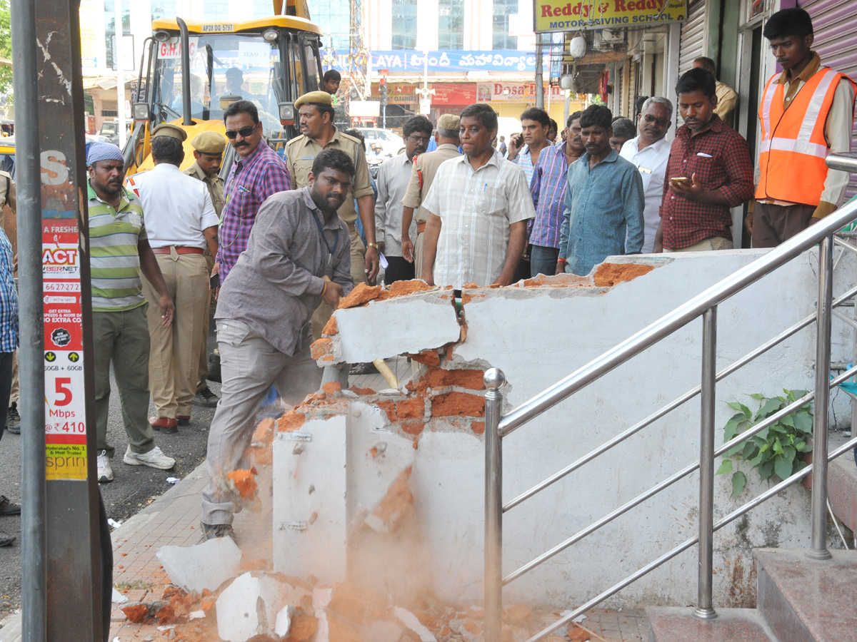 Demolition of Footpath Photo Gallery - Sakshi6