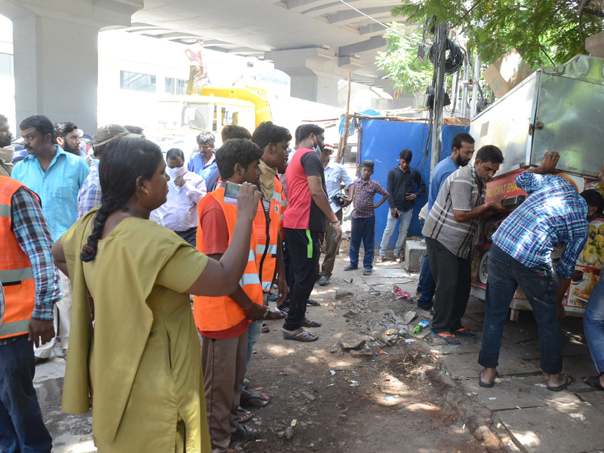 Demolition of Footpath Photo Gallery - Sakshi8