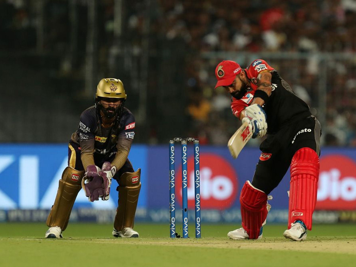 royal challengers won 10 runs kolkata knight riders - Sakshi13