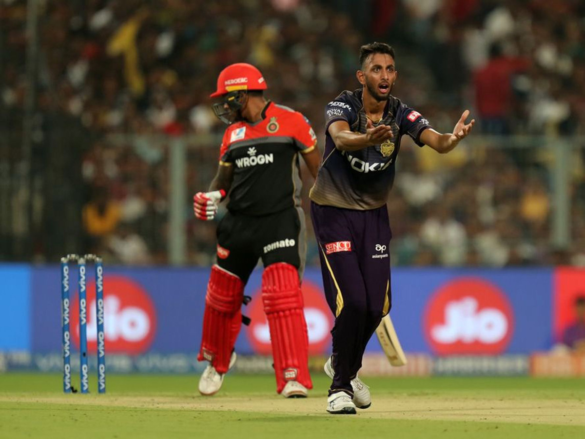 royal challengers won 10 runs kolkata knight riders - Sakshi14