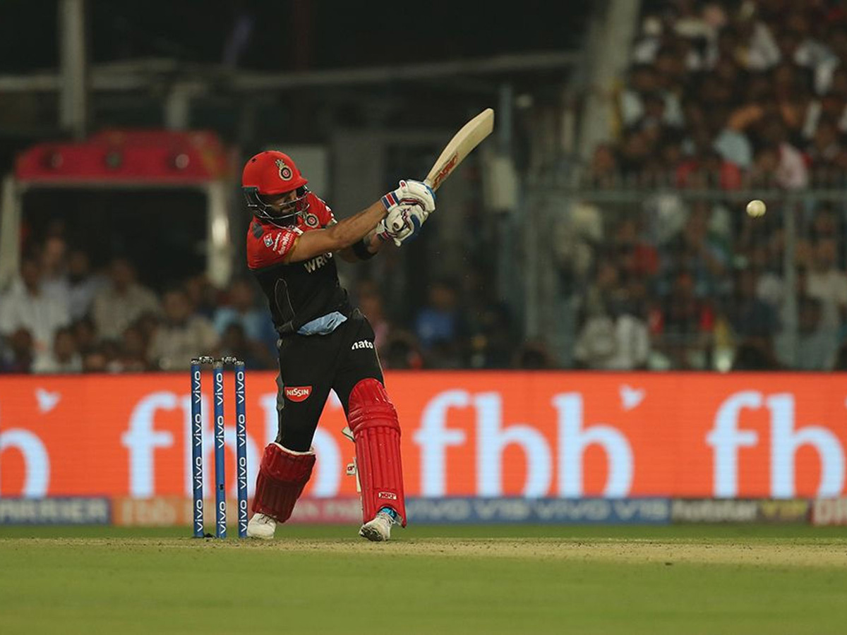 royal challengers won 10 runs kolkata knight riders - Sakshi2