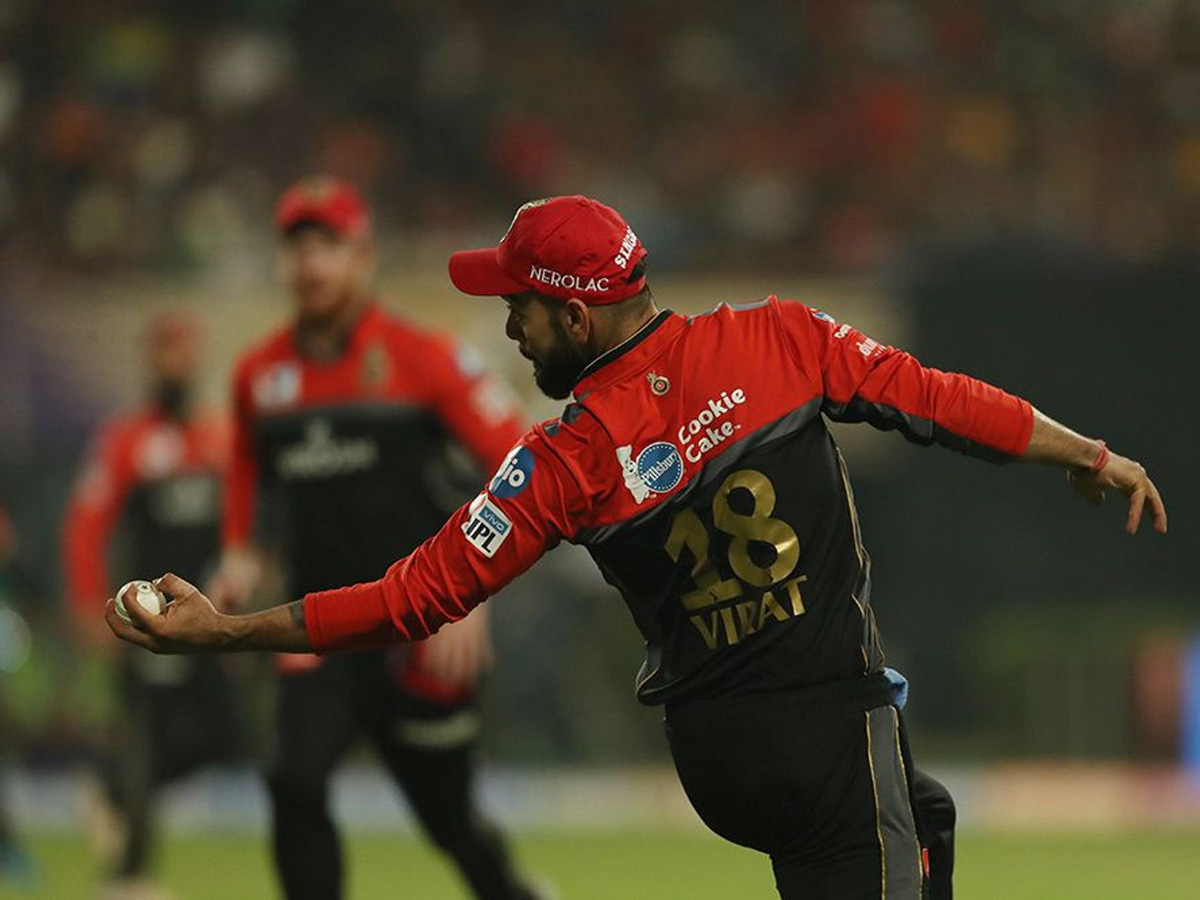 royal challengers won 10 runs kolkata knight riders - Sakshi22