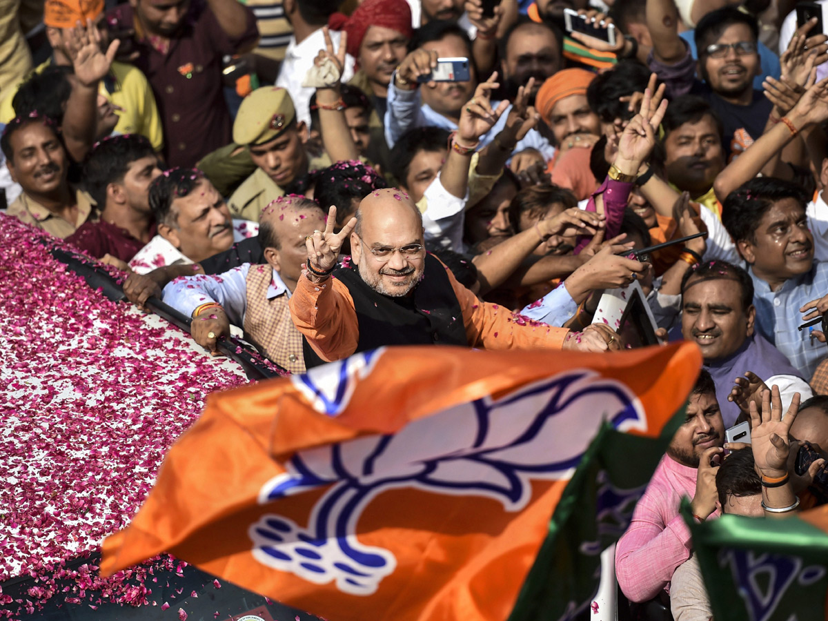 BJP supporters celebrate after trends indicate clean sweep for NDA - Sakshi1