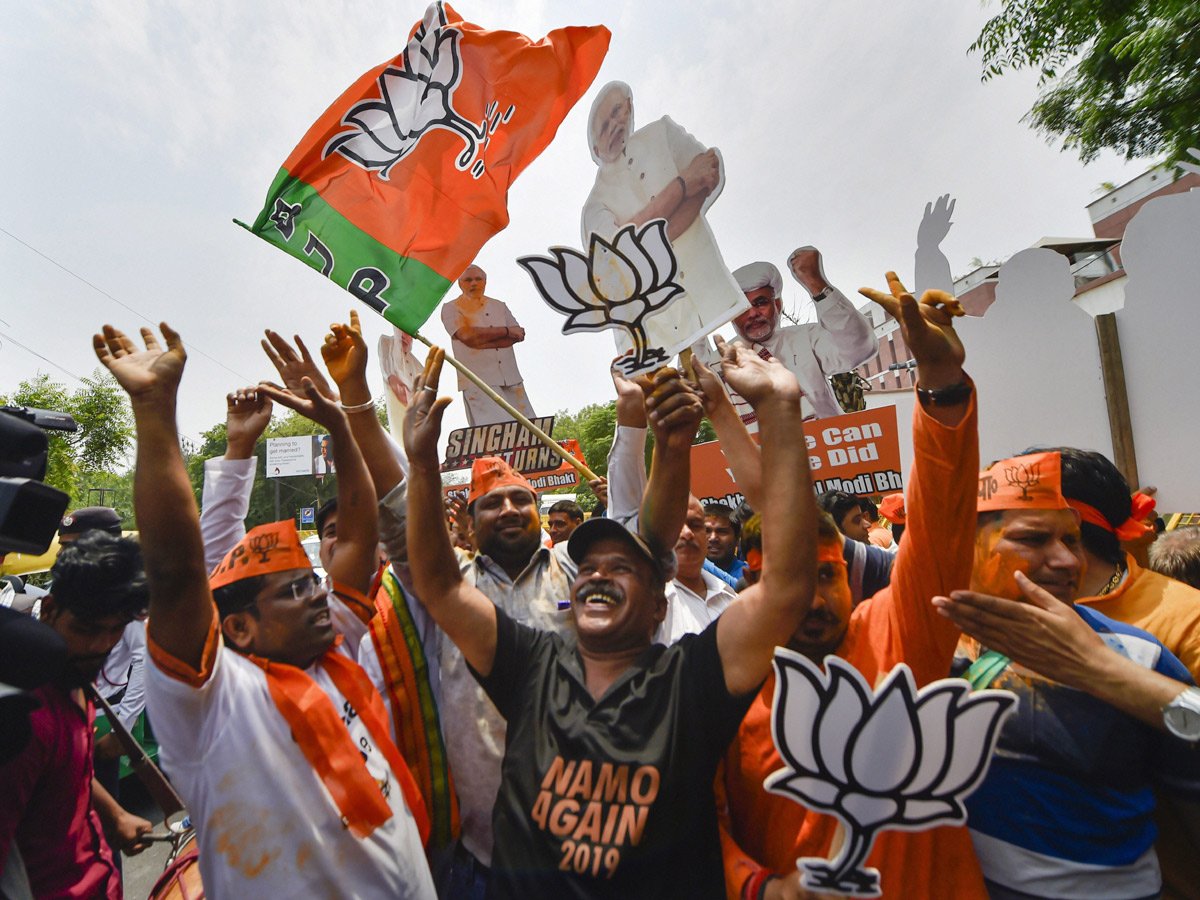 BJP supporters celebrate after trends indicate clean sweep for NDA - Sakshi17