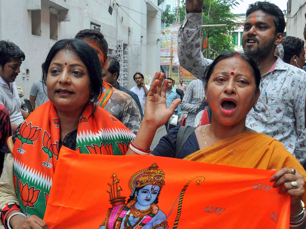 BJP supporters celebrate after trends indicate clean sweep for NDA - Sakshi24
