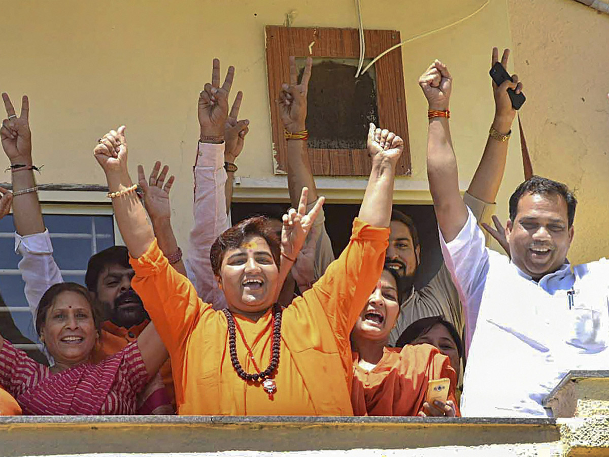 BJP supporters celebrate after trends indicate clean sweep for NDA - Sakshi26