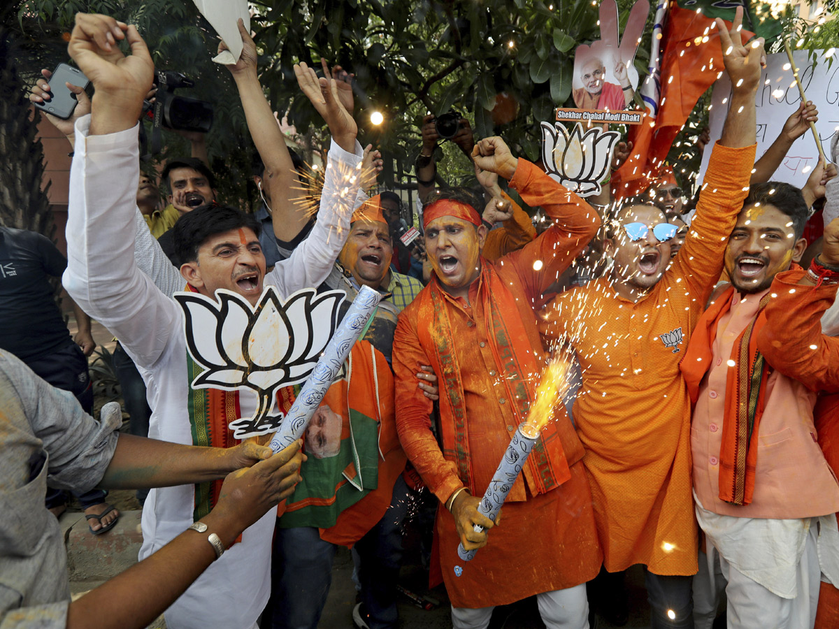 BJP supporters celebrate after trends indicate clean sweep for NDA - Sakshi32