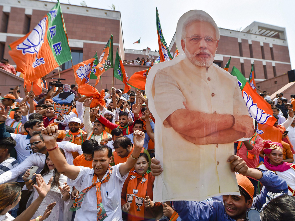 BJP supporters celebrate after trends indicate clean sweep for NDA - Sakshi9