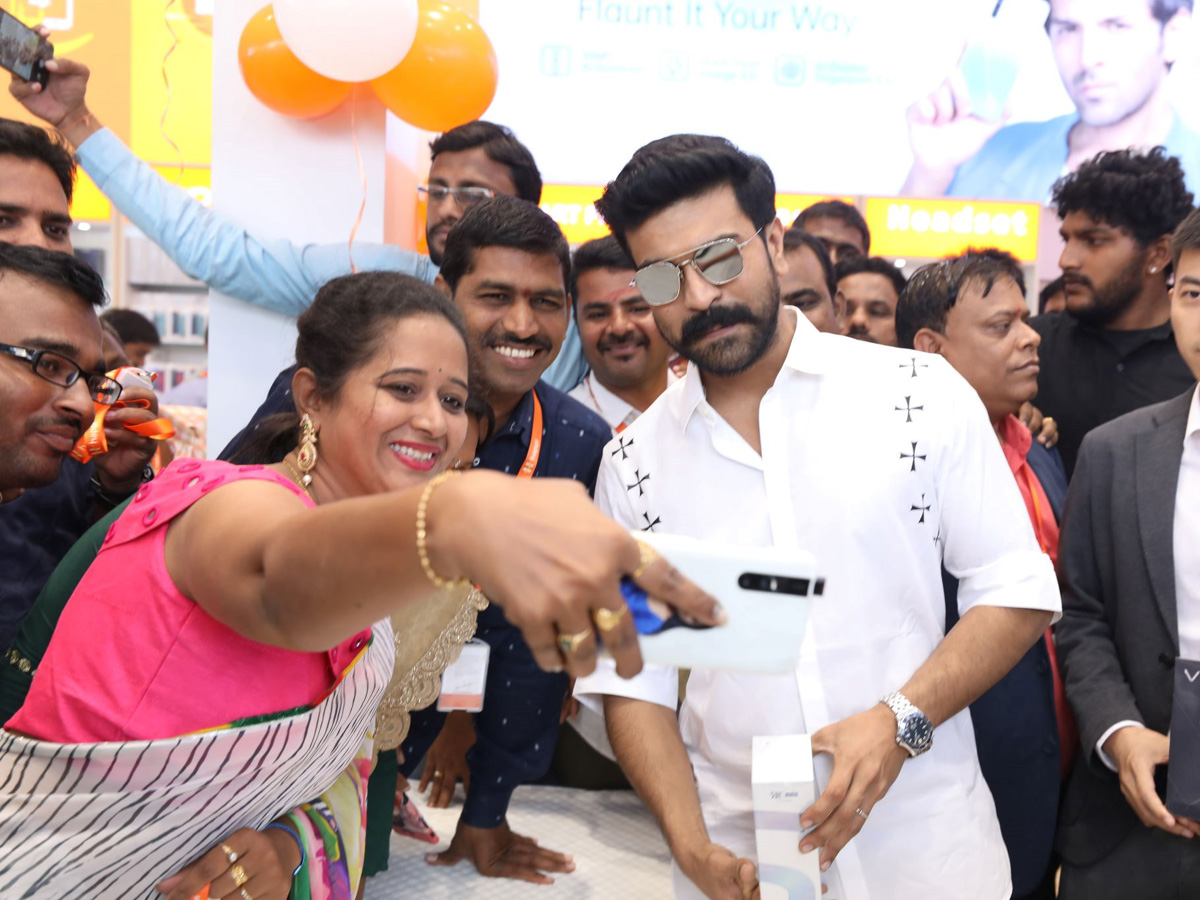 Ram Charan Launches Happi Mobiles At Vijayawada Photo Gallery - Sakshi1