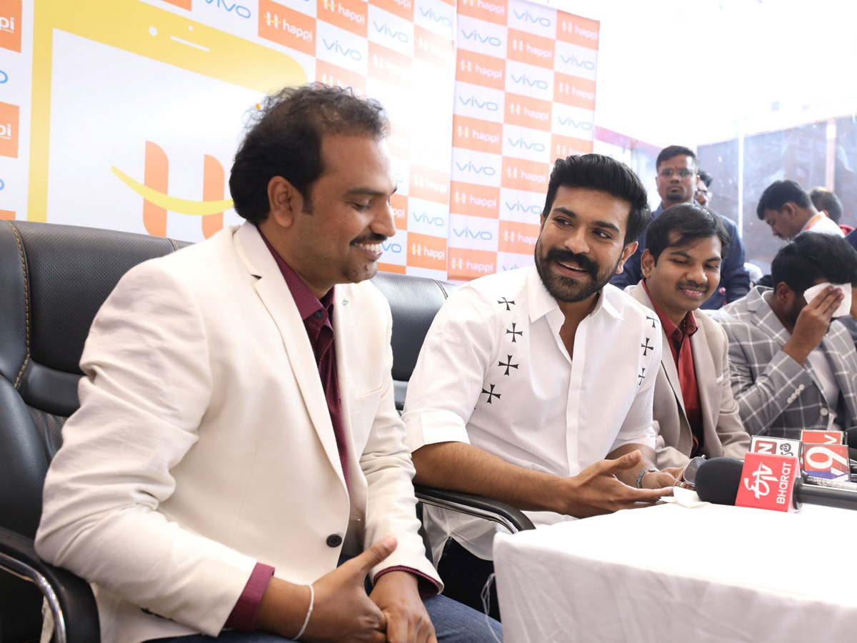 Ram Charan Launches Happi Mobiles At Vijayawada Photo Gallery - Sakshi10
