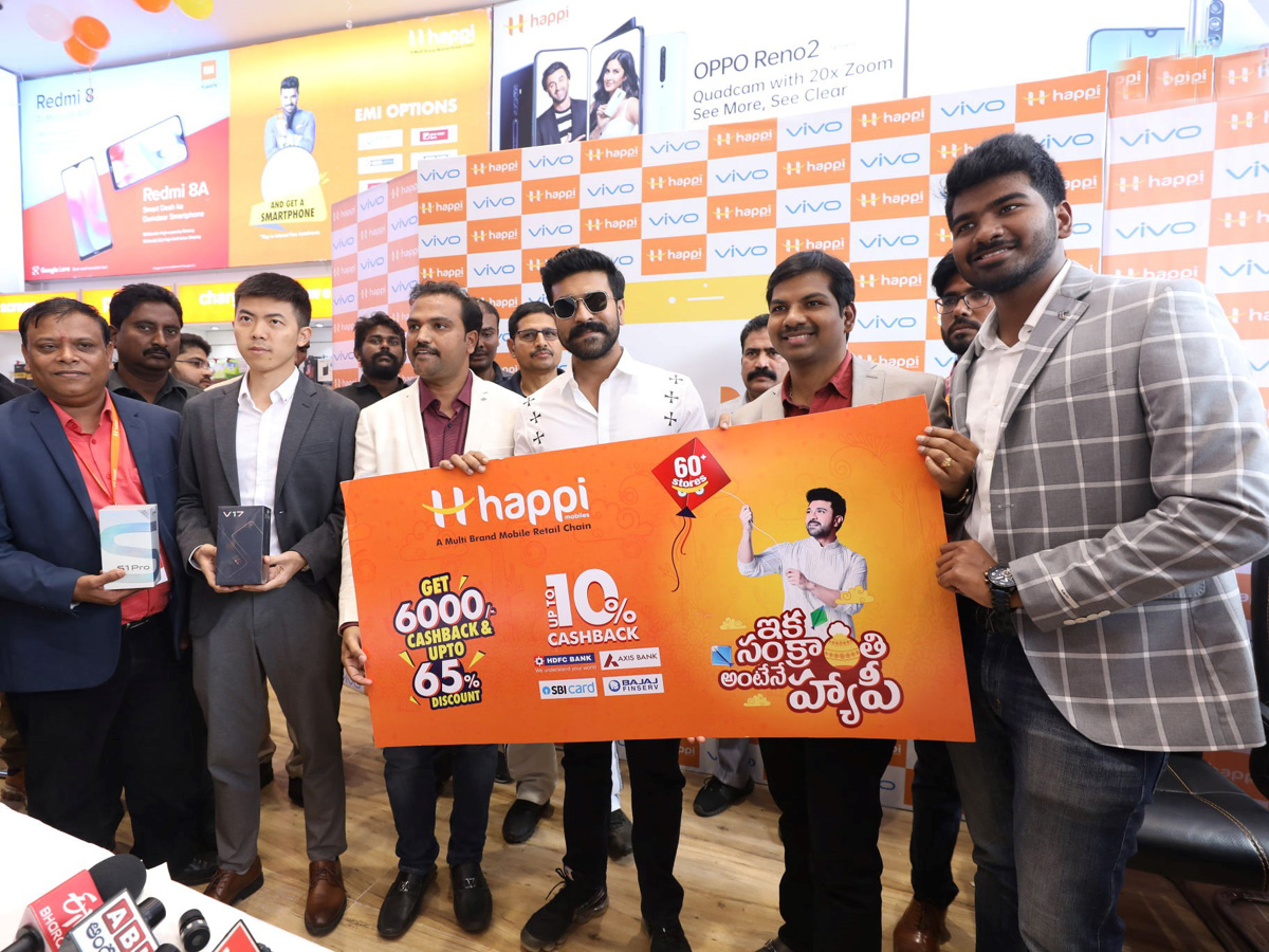 Ram Charan Launches Happi Mobiles At Vijayawada Photo Gallery - Sakshi2