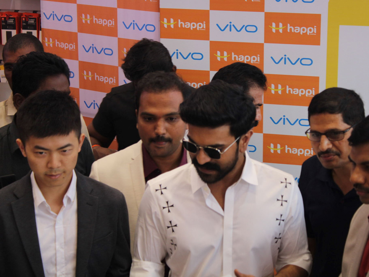 Ram Charan Launches Happi Mobiles At Vijayawada Photo Gallery - Sakshi7