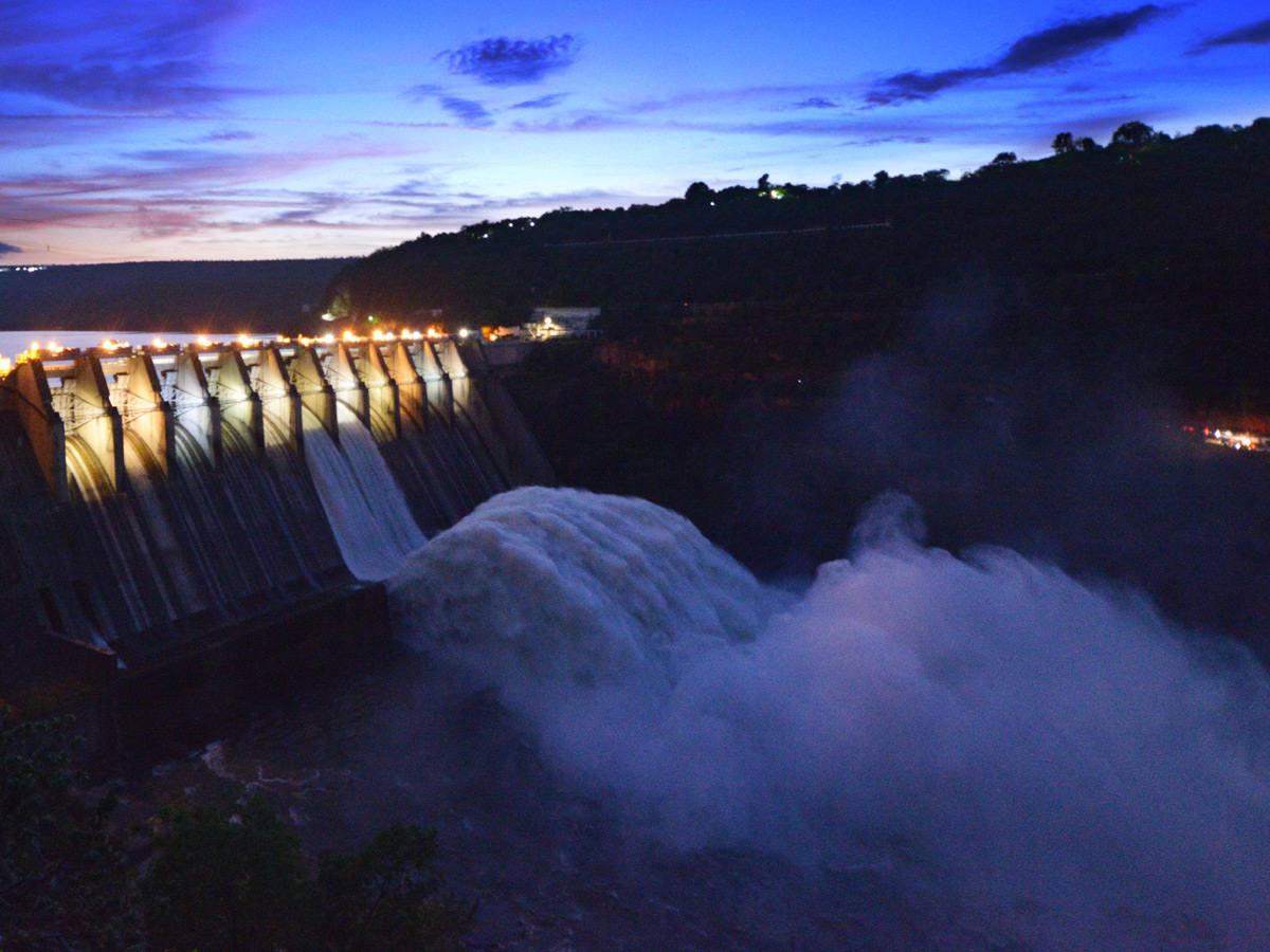 Srisailam Dam Gates Opened - Sakshi14