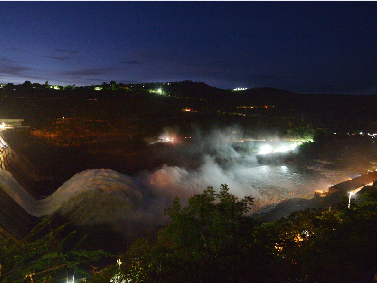 Srisailam Dam Gates Opened - Sakshi4