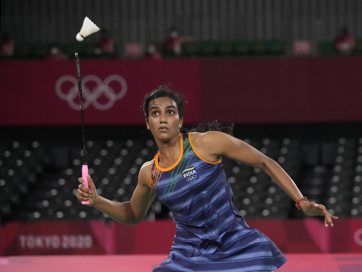 PV Sindhu becomes first Indian shuttler to reach two Olympic semis Photo Gallery - Sakshi9