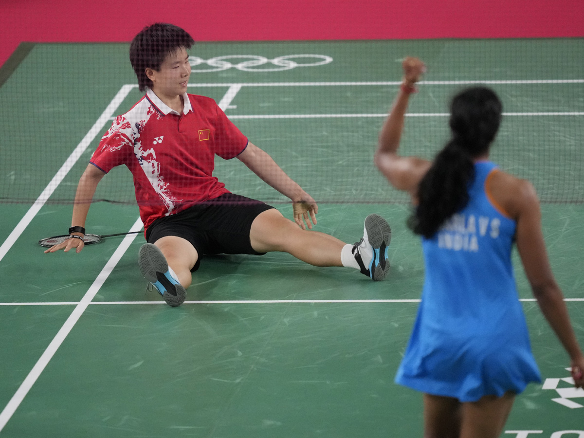 PV Sindhu Beats He Bing Jiao To Win Historic Bronze At Tokyo Olympics Photo Gallery - Sakshi14