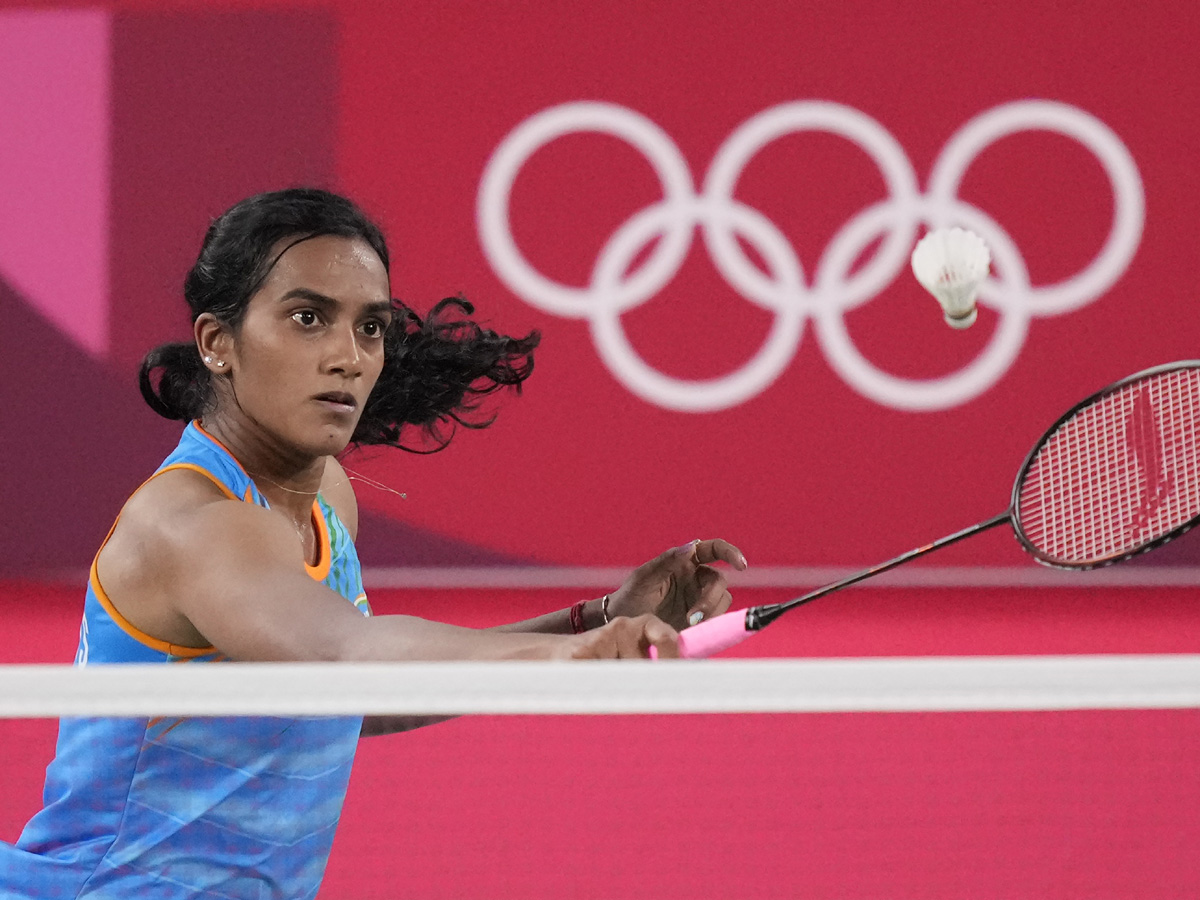 PV Sindhu Beats He Bing Jiao To Win Historic Bronze At Tokyo Olympics Photo Gallery - Sakshi11