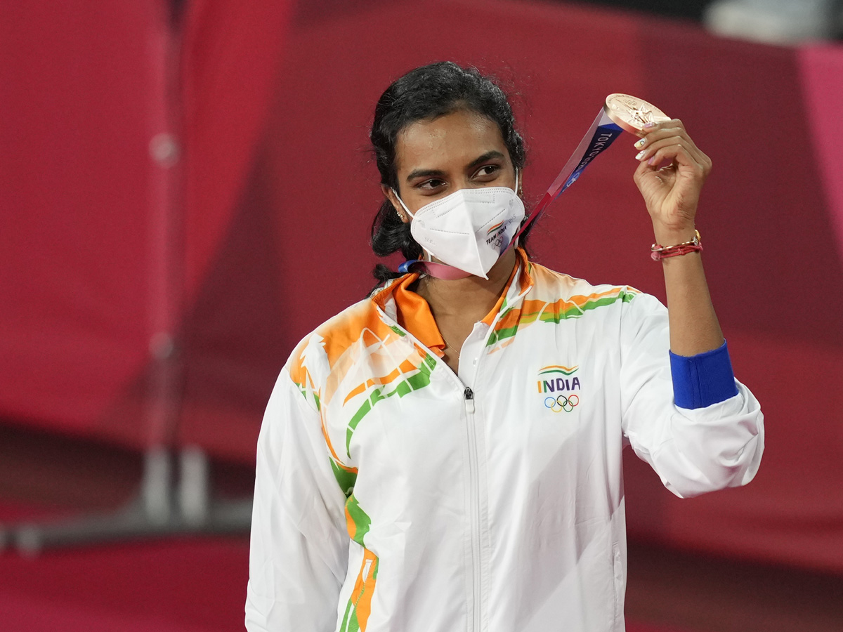 PV Sindhu Beats He Bing Jiao To Win Historic Bronze At Tokyo Olympics Photo Gallery - Sakshi2