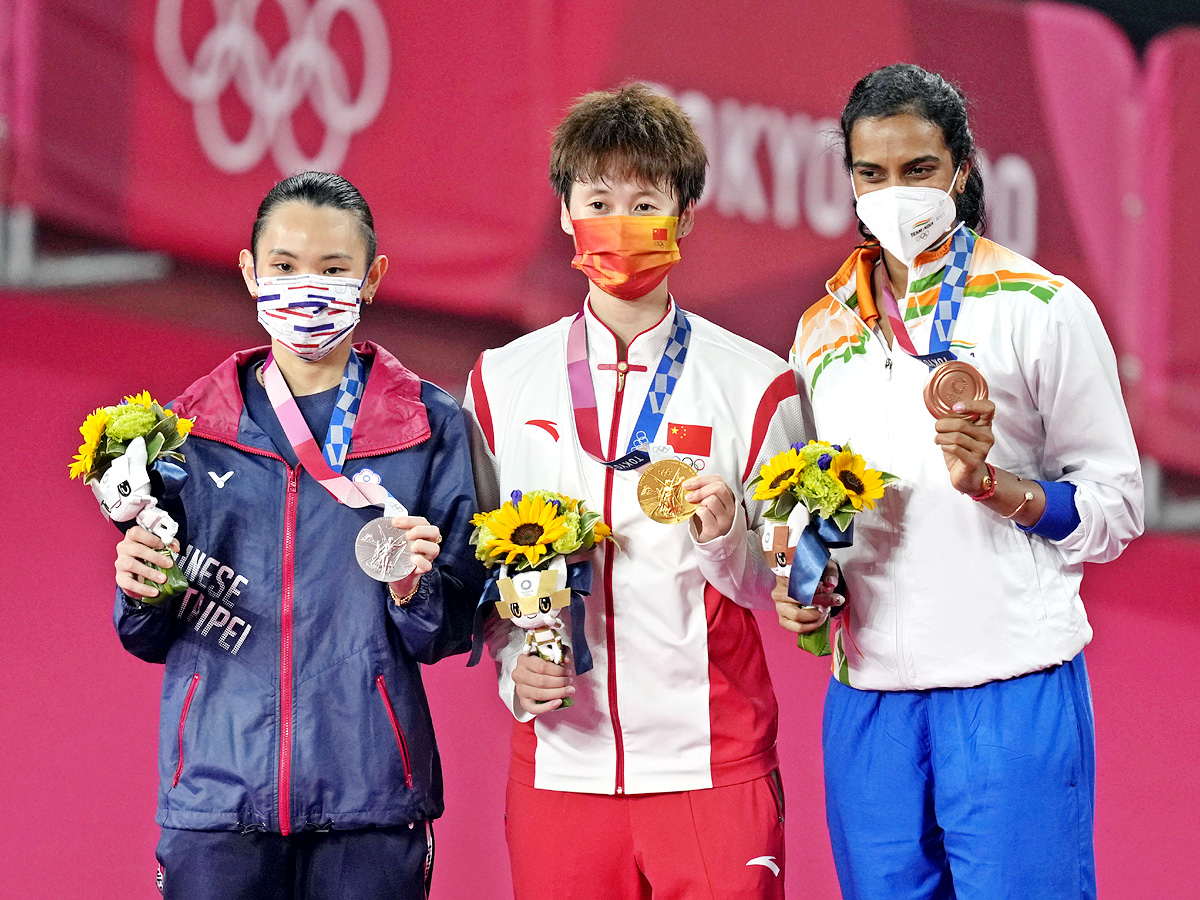 PV Sindhu Beats He Bing Jiao To Win Historic Bronze At Tokyo Olympics Photo Gallery - Sakshi1