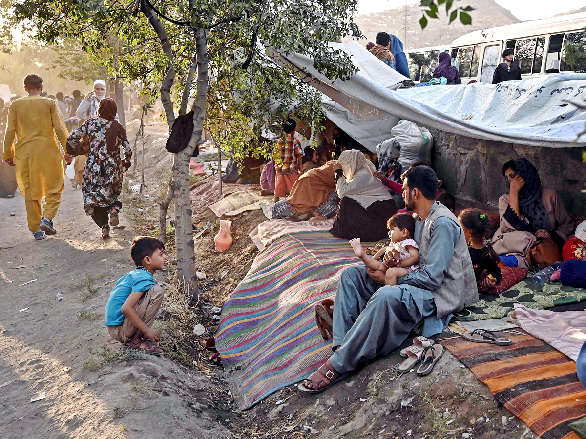 Afghan leader rallies forces in besieged northern city - Sakshi22