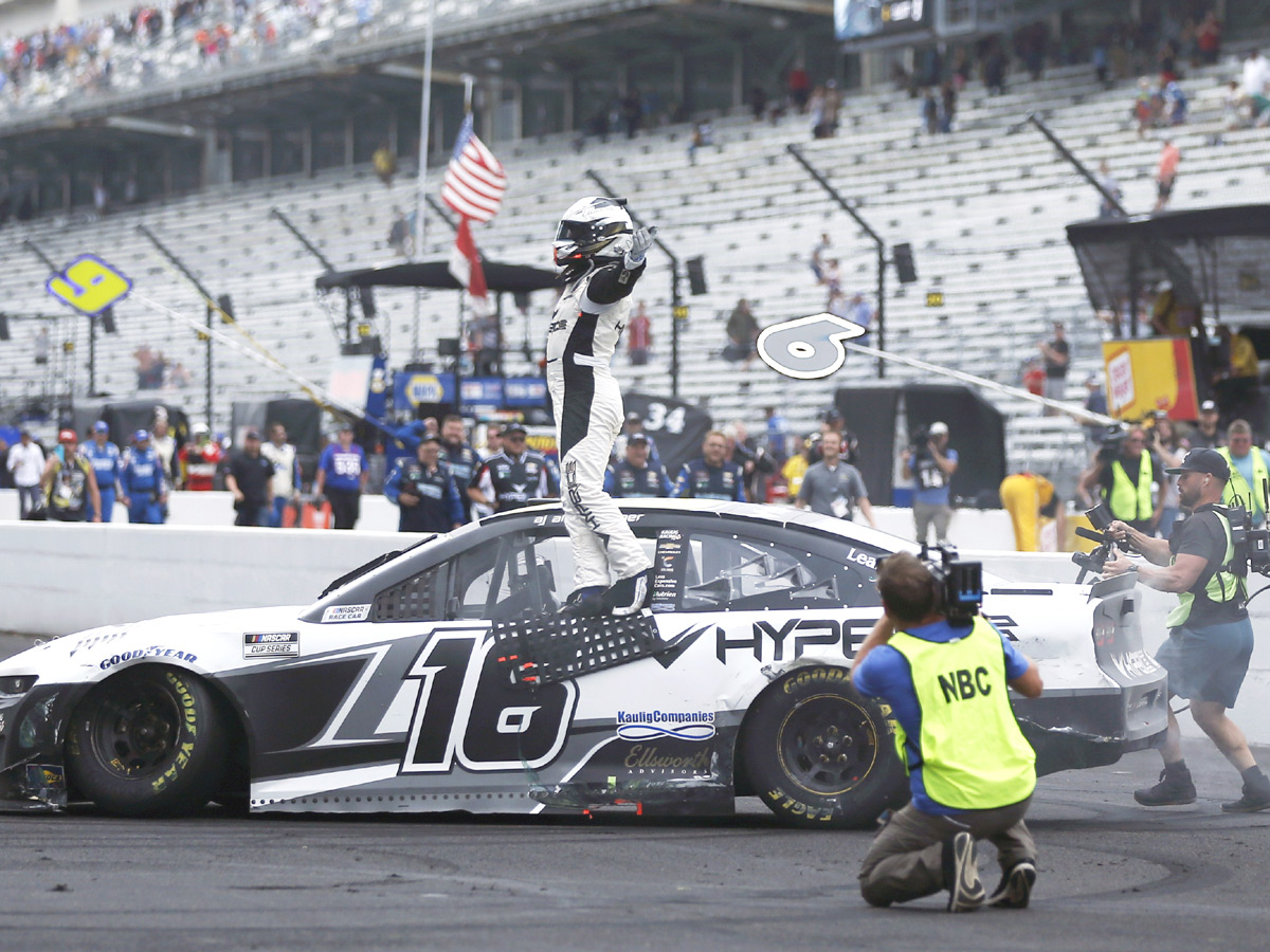 AJ Allmendinger celebrates after winning a NASCAR Series auto race Photo Gallery - Sakshi10